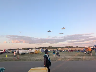 Warbird flyby. Lead by a P-38, and a B-29, DC-6, and the only airworthy PB4Y-2.