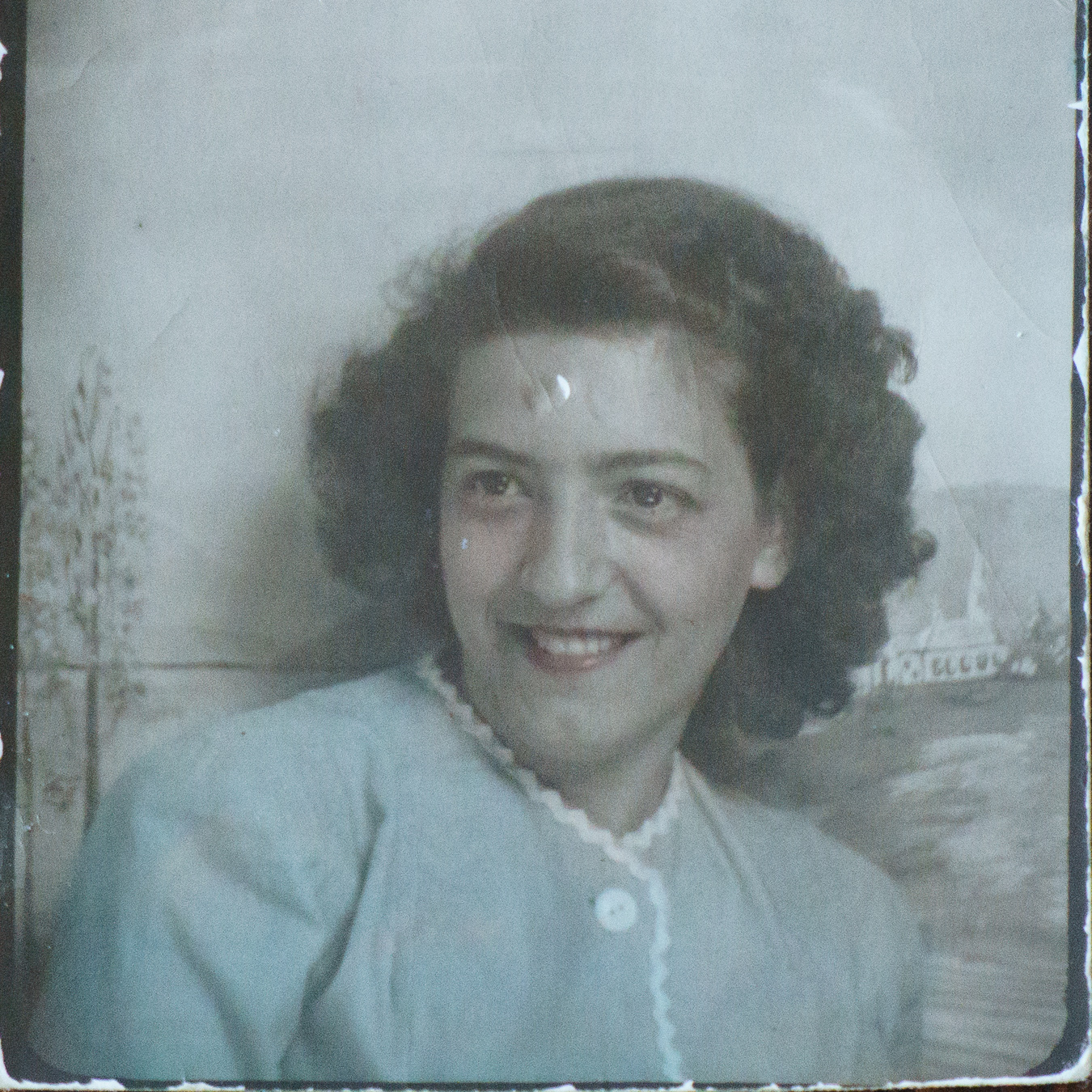 Before, old damaged photo of a young lady