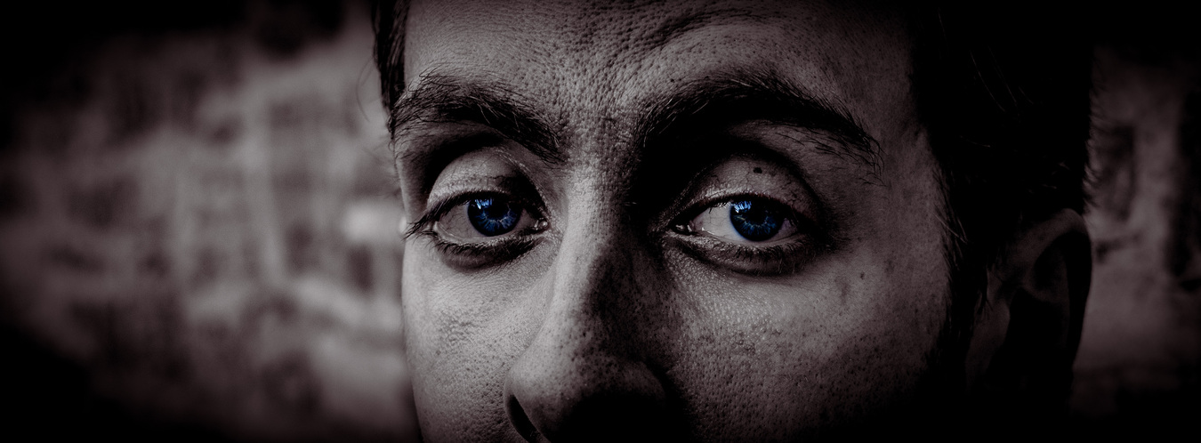 A portrait of a man that highlights his facial flaws