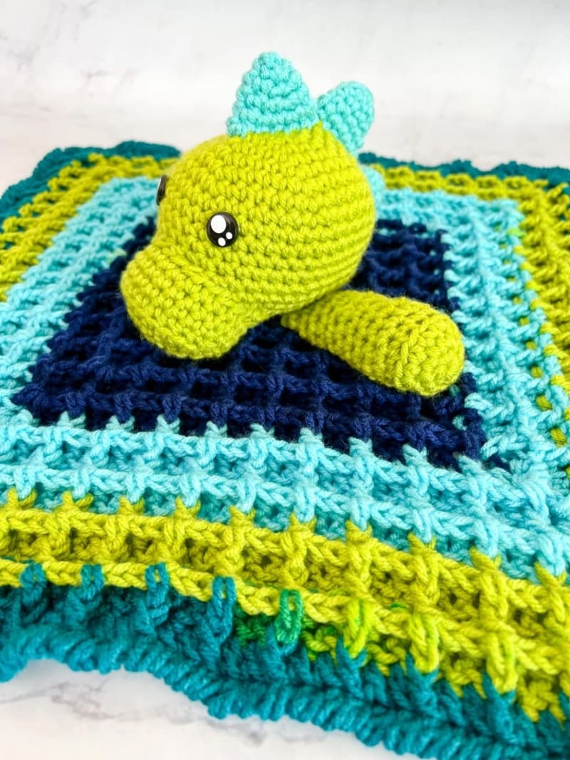 ### Dino Baby Lovey