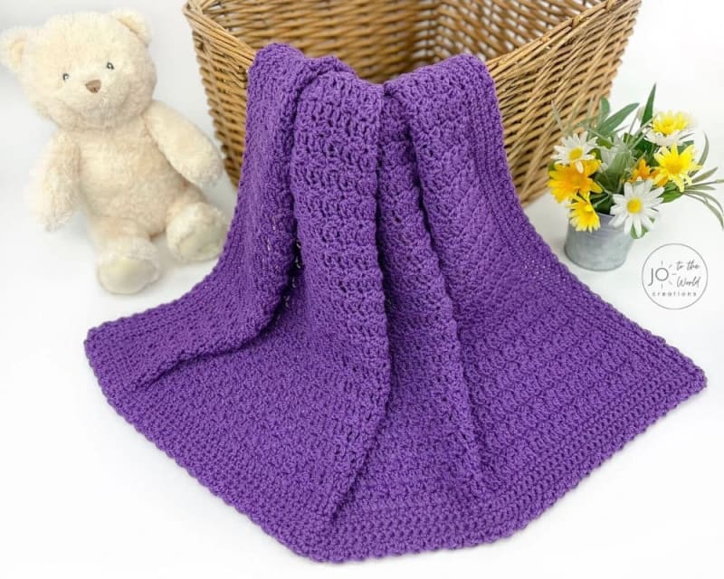 https://res.cloudinary.com/dbjxr1kdv/image/upload/v1786453375/modern-crochet-baby-blanket-patt_dncanl.webp