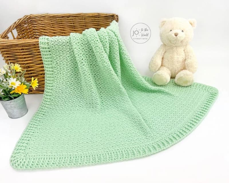 https://res.cloudinary.com/dbjxr1kdv/image/upload/v1786453431/charming-crochet-baby-blanket-pa_lebwf3.webp