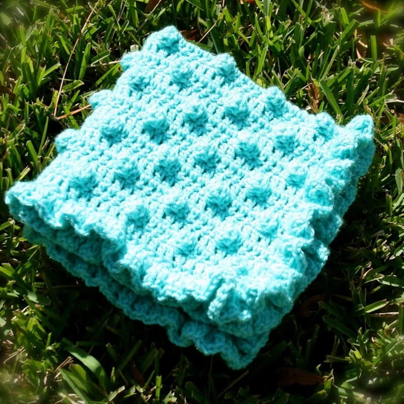 ## Polka Dots & Frills Baby Blanket