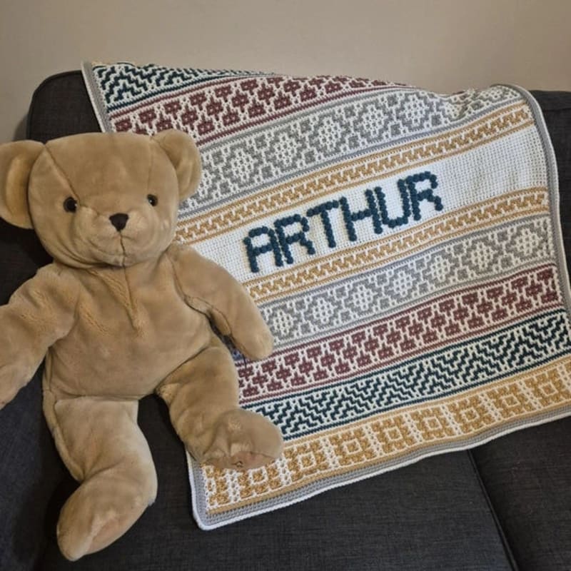 ## Lullaby Name Mosaic Personalized Baby Blanket