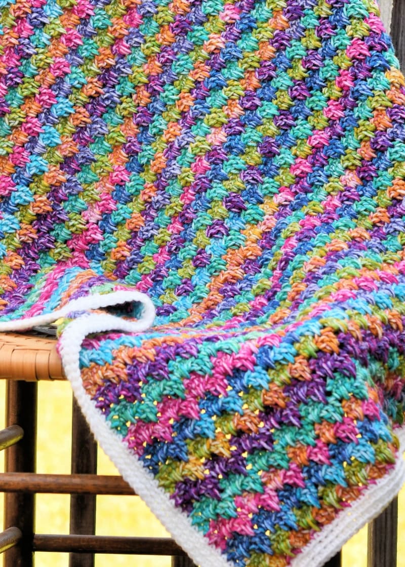 ## Bitty Melted Crayons Baby Blanket