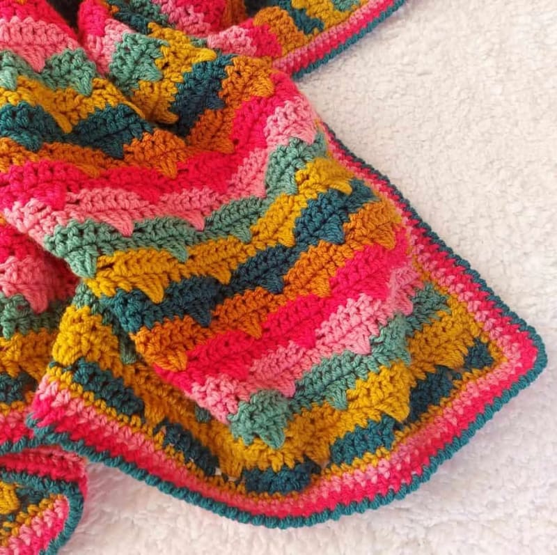## Scallop Parade Baby Blanket by Annie Design Crochet