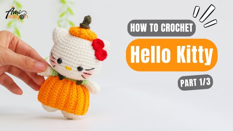 ## Hello Kitty in a Pumpkin Outfit by Ami Saigon