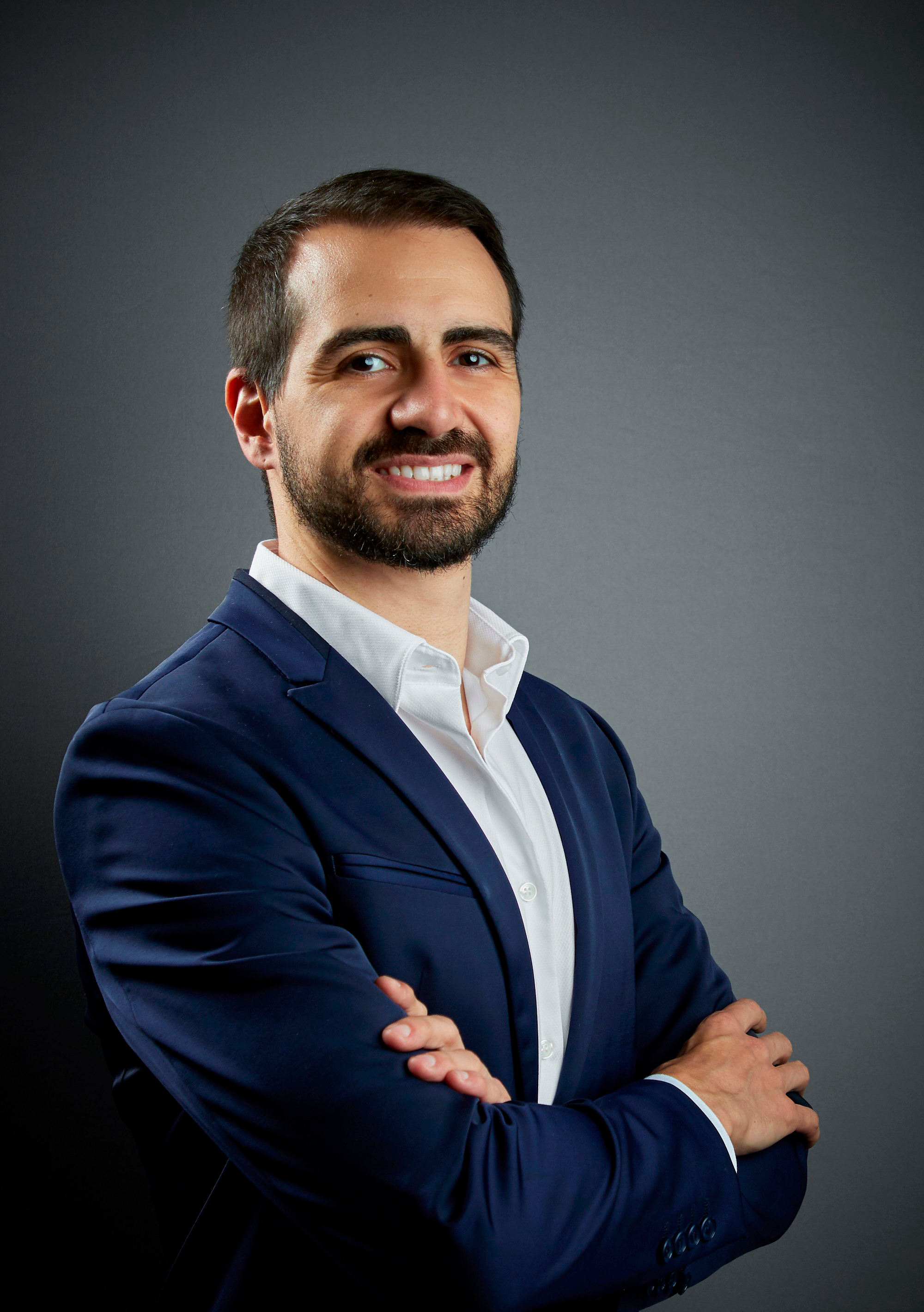 Professional portrait of Eric Luciano, CEO and Founder