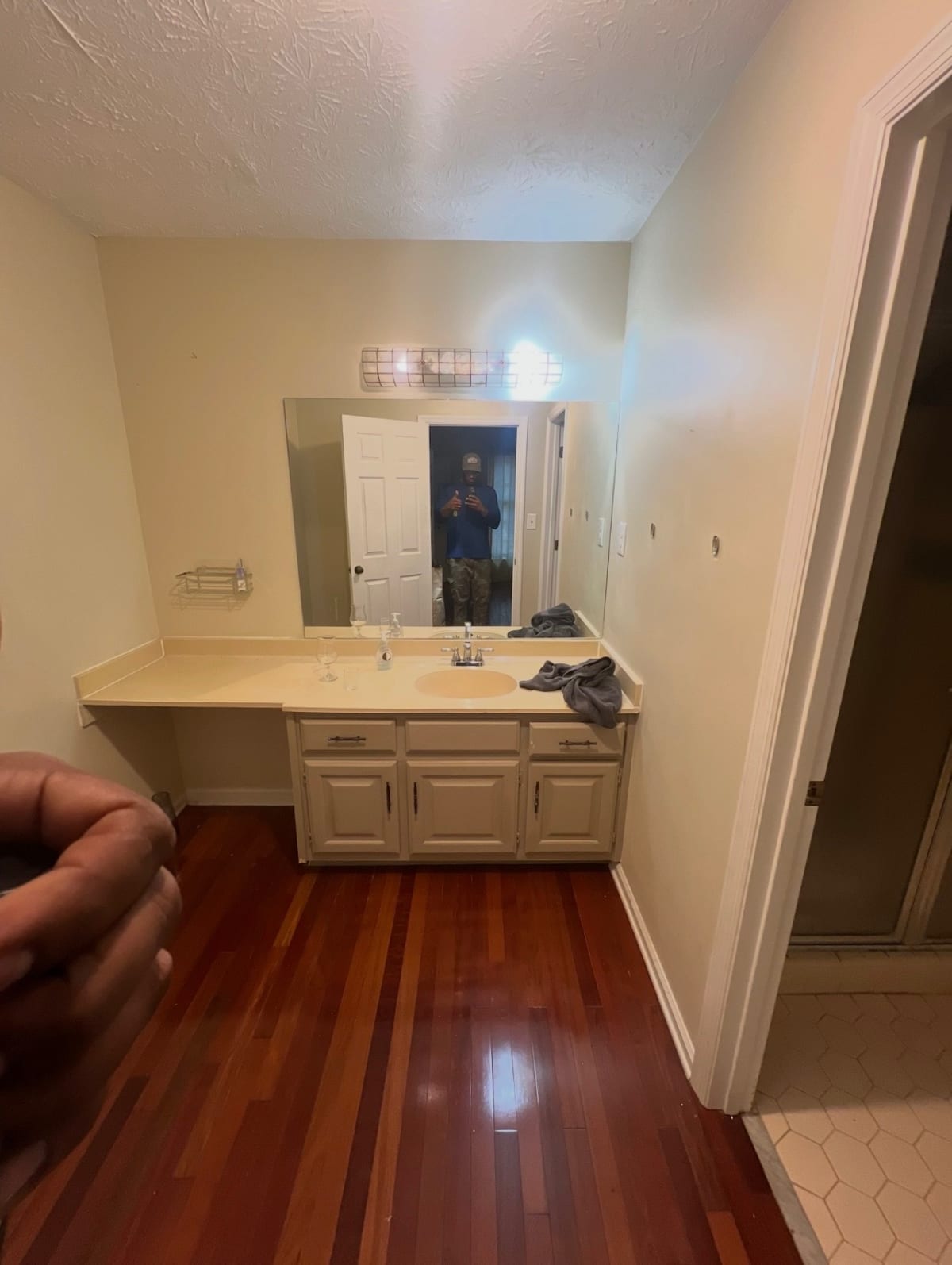 Small bathroom with outdated mirror and vanity before cosmetic refresh - Atlanta metro project 5