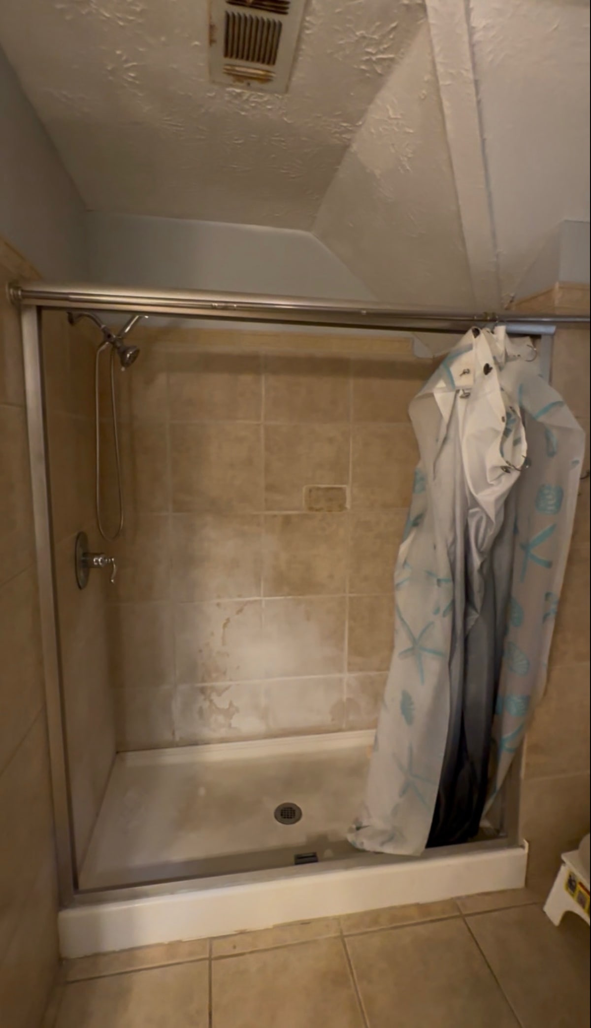 Older bathroom with worn surfaces and original lighting before remodel - Atlanta metro project 6