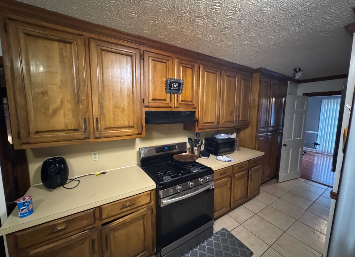 Aging kitchen with worn surfaces and original fixtures before remodel - Atlanta metro project 6