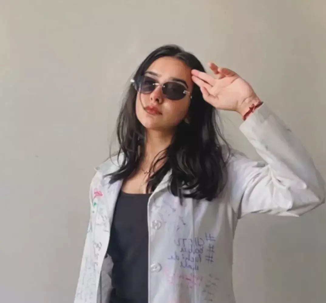 The iconic white coat