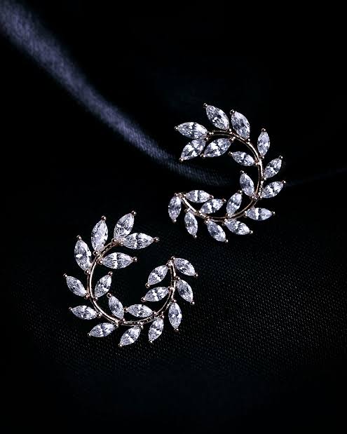 Manikarnika limited-edition earring, silver and garnet, hero photograph