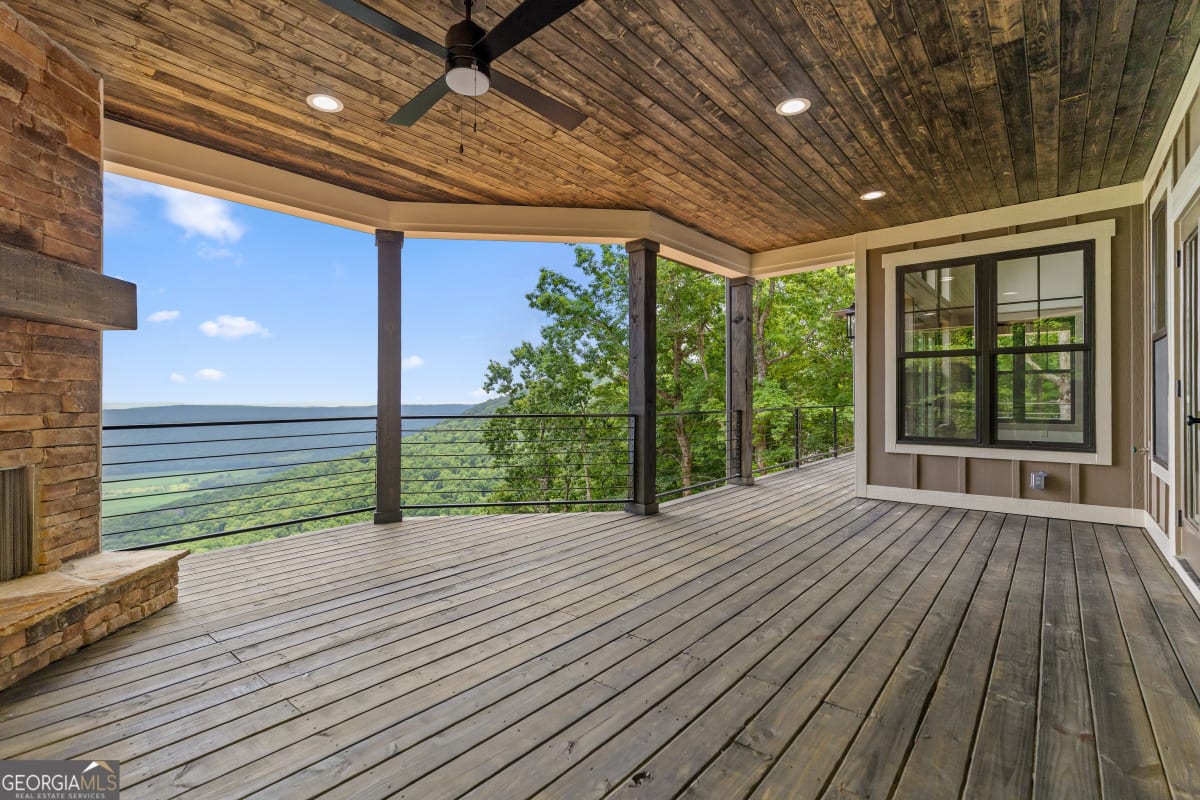 Covered outdoor living with wood-burning fireplace