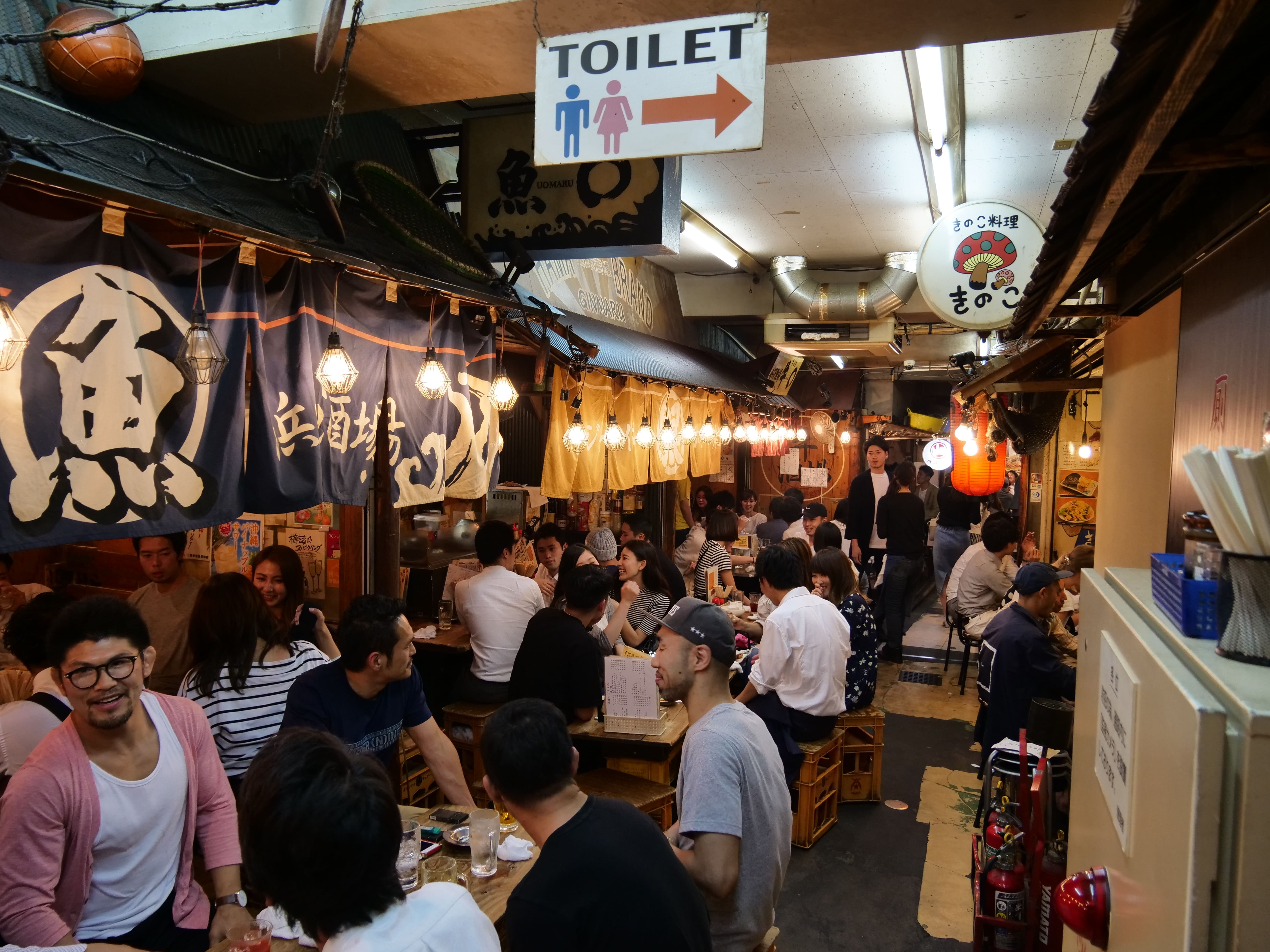 Soaking up the atmosphere of the lively food alley