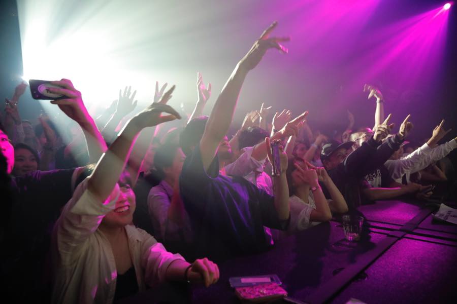 People enjoying club music
