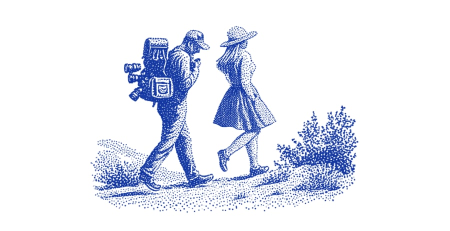 Photographer walking with girlfriend