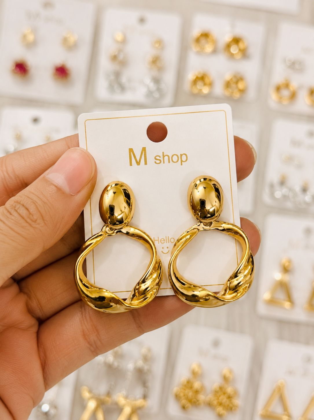Twisted Gold Drop Earrings in Gold – Accessories from Handpicked