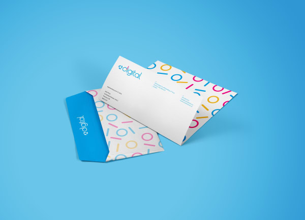 UHN Digital: brand identity stationery, carrying the binary-confetti pattern I designed.