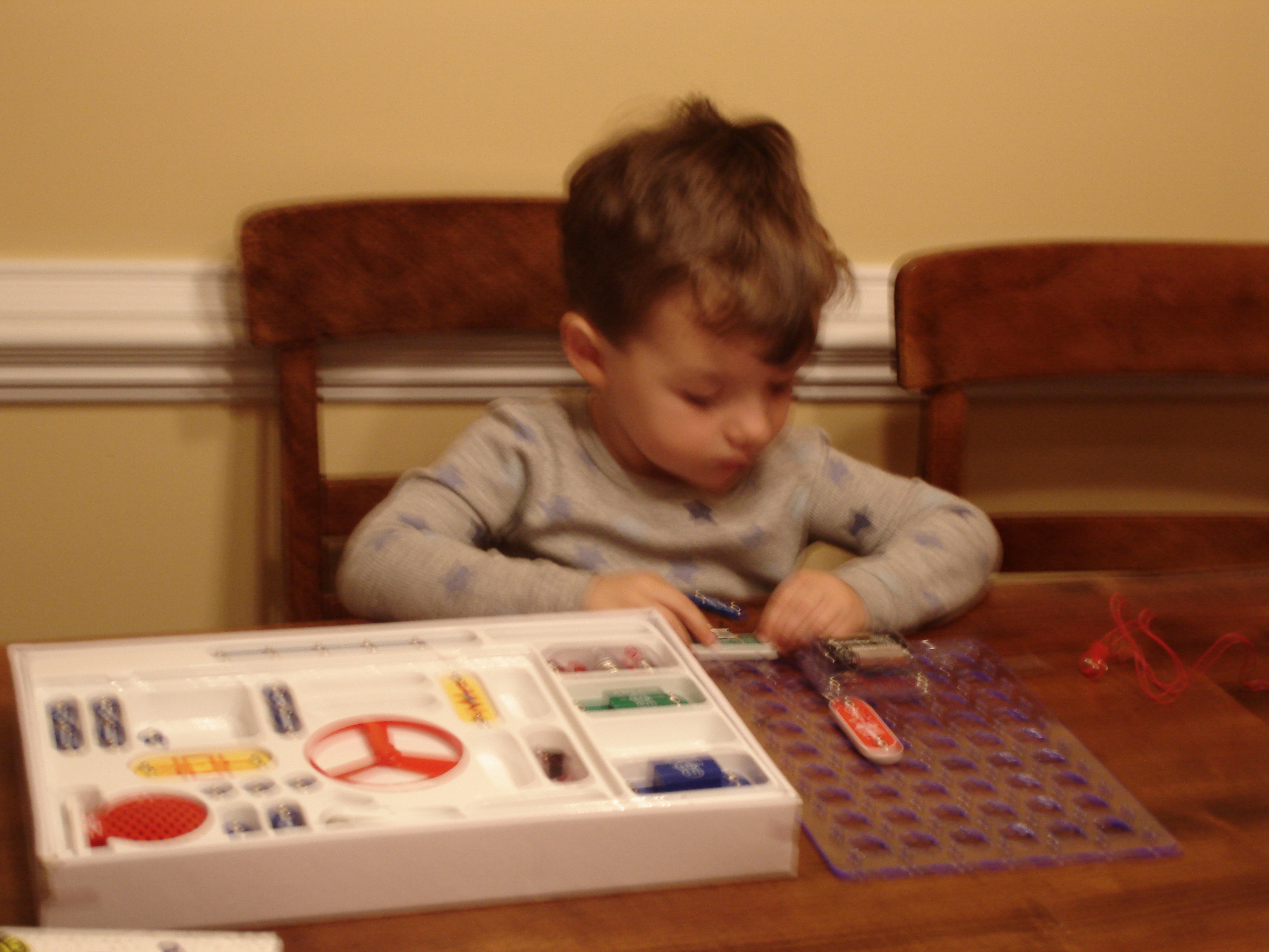 Luke playing with Snap Circuits when he was 3 years old