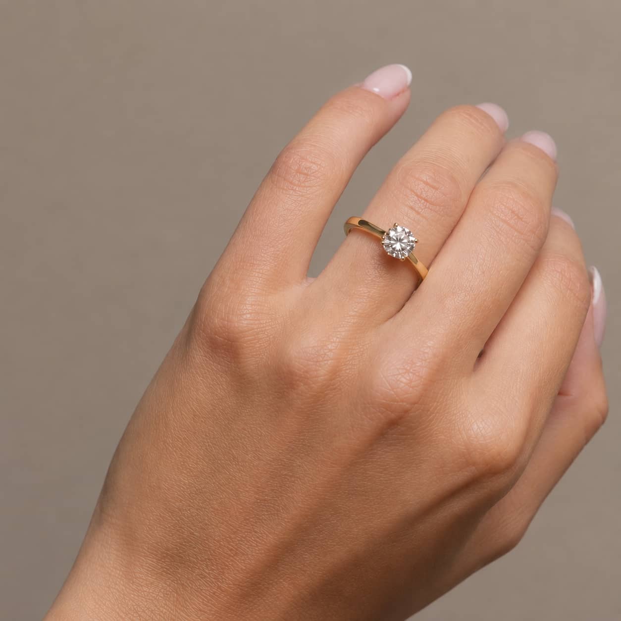 Era (Yellow Gold) worn on the hand