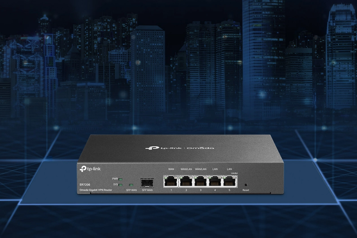 TP-Link Omada Gigabit VPN Router displayed against a glowing city skyline. The router features multiple ports for connectivity, conveying innovation.