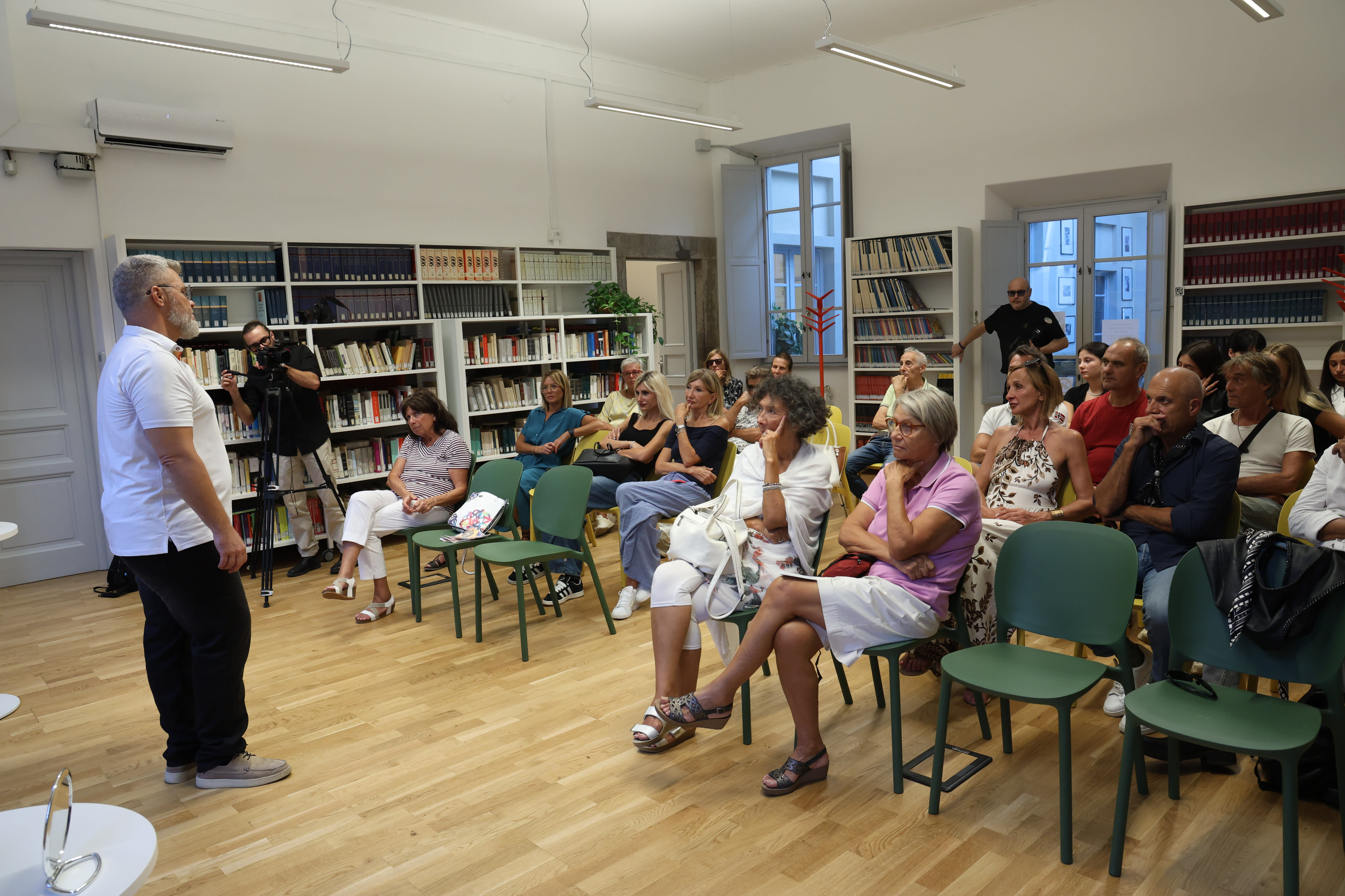 Conference speaker and audience