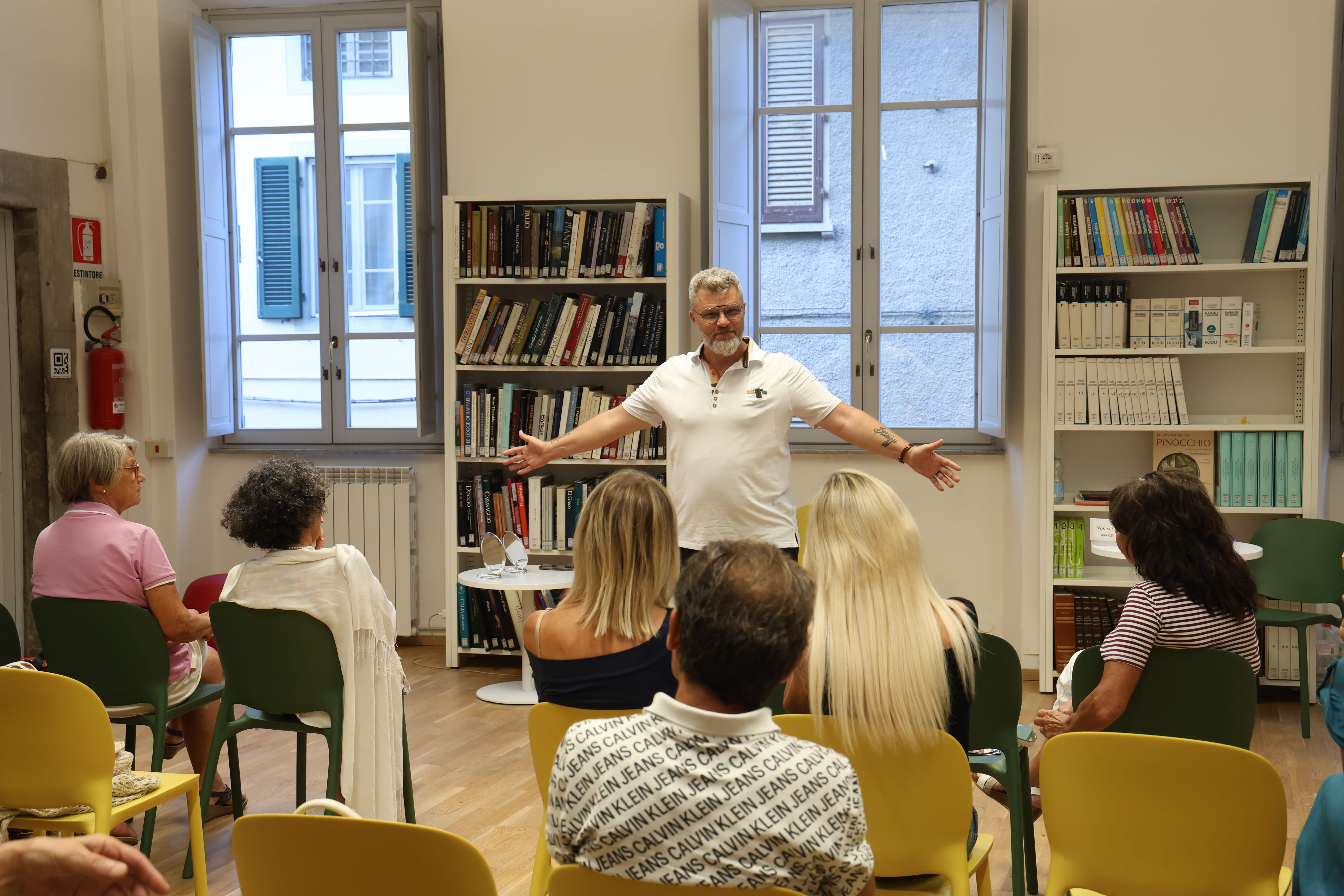 Daniel speaking at a conference