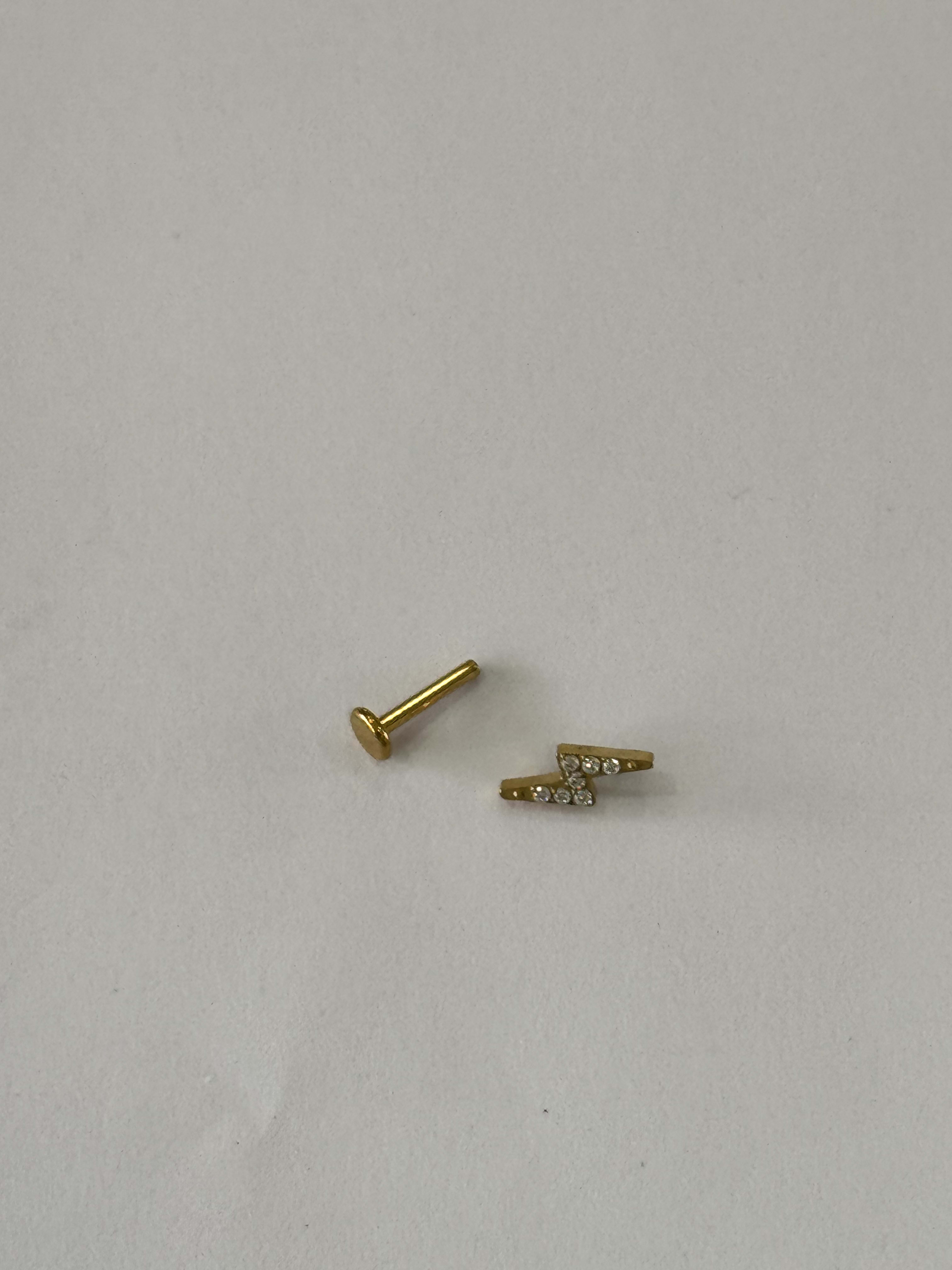 Piercing labret titanio 16G, rayo con 7 zirconias