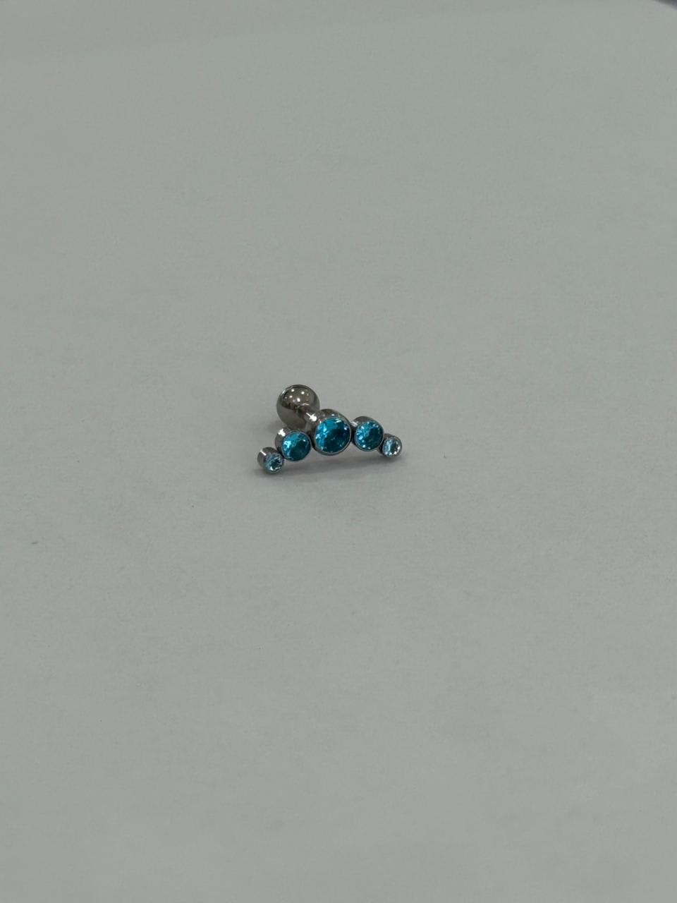 Arco con zirconias azules. Piercing de acero quirúrgico 316L