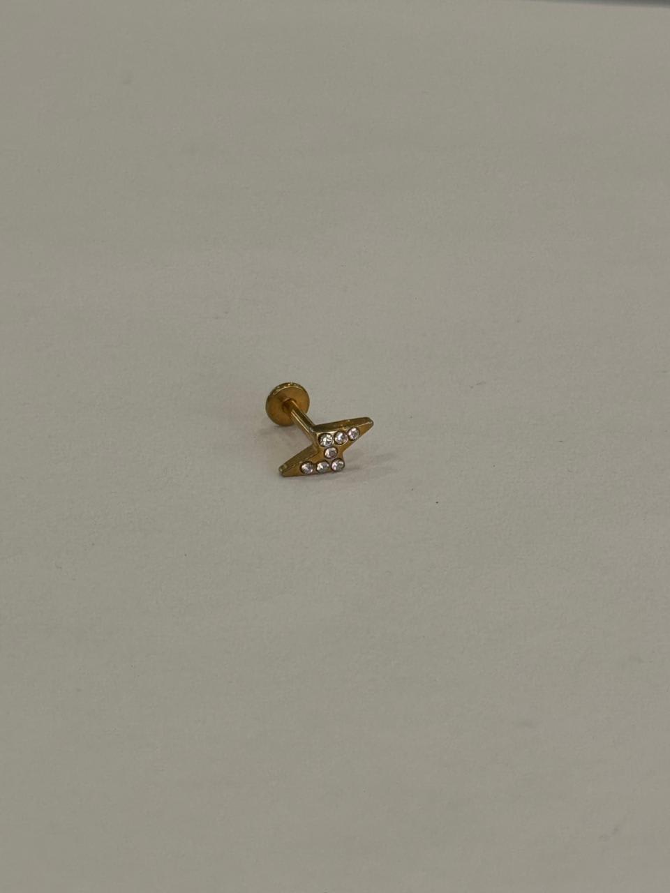 Rayo con zirconias. Piercing de acero quirúrgico grado implante 316L