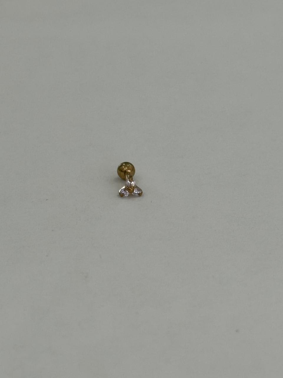 Trebol dorado con 3 zirconias. Piercing de acero quirúrgico 316L