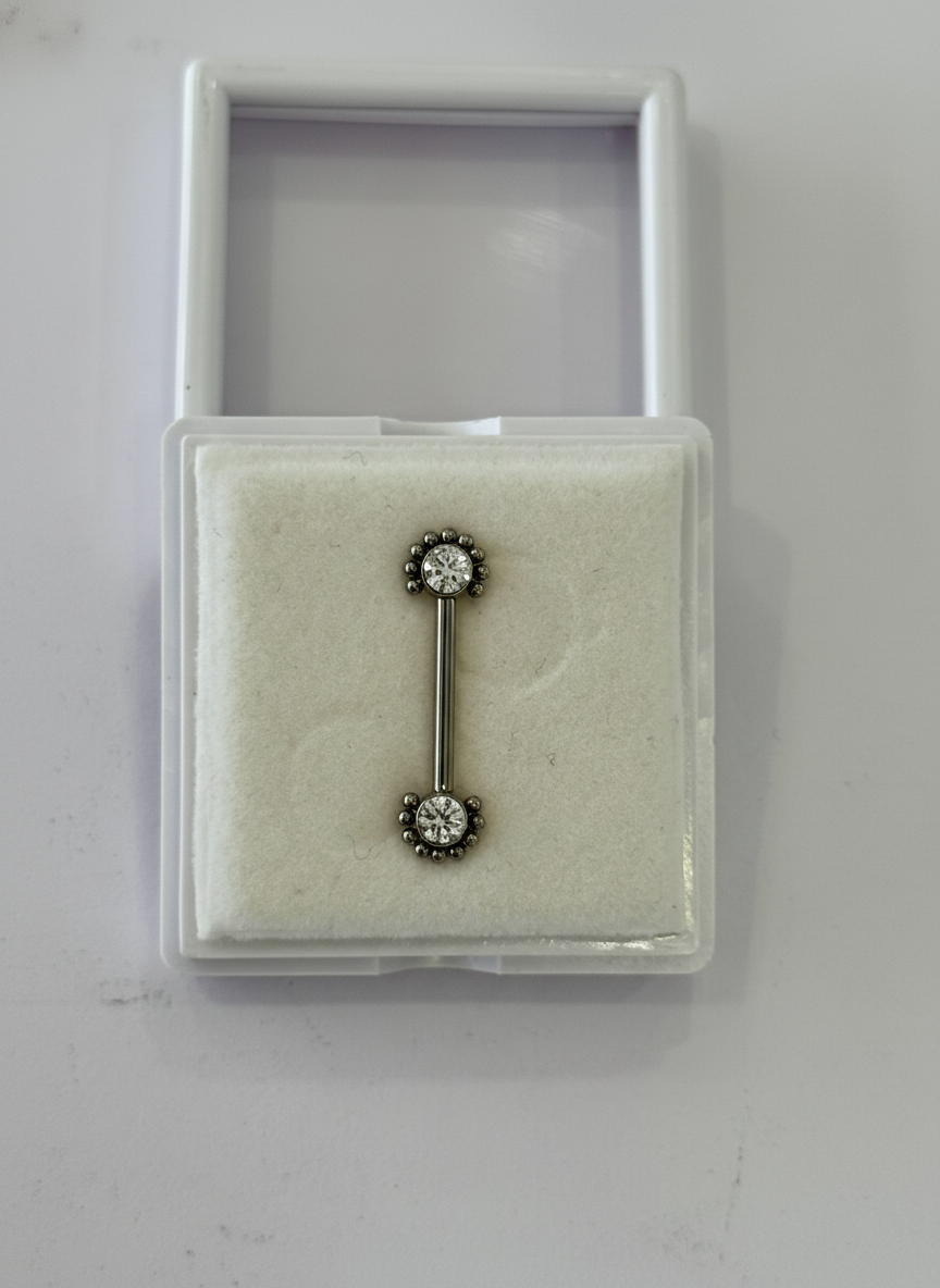 Piercing pezon titanio 14G, balites y zirconia.