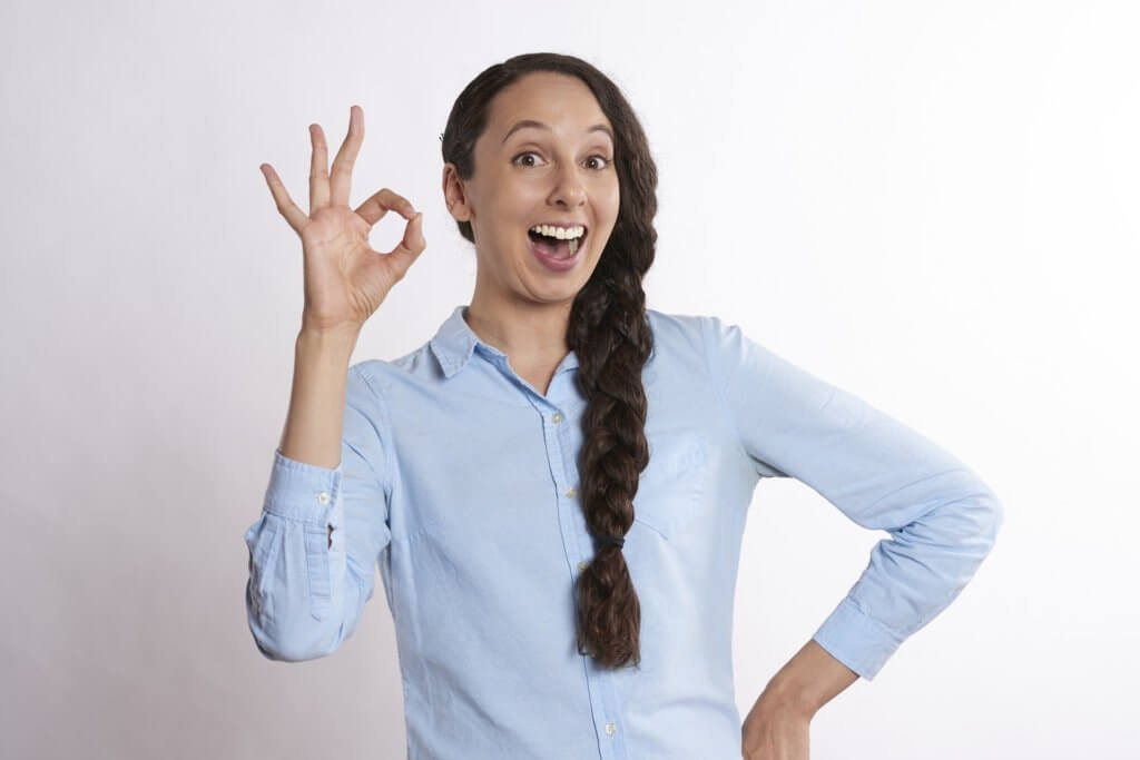 Woman who is satisfied with her HVAC system