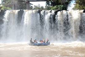 River Sagana white water rapids and lush green landscape near Mount Kenya Kenya