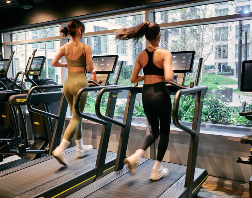 Thumbnail Residents running on treadmills in a modern fitness suite at Bloom Nine Elms