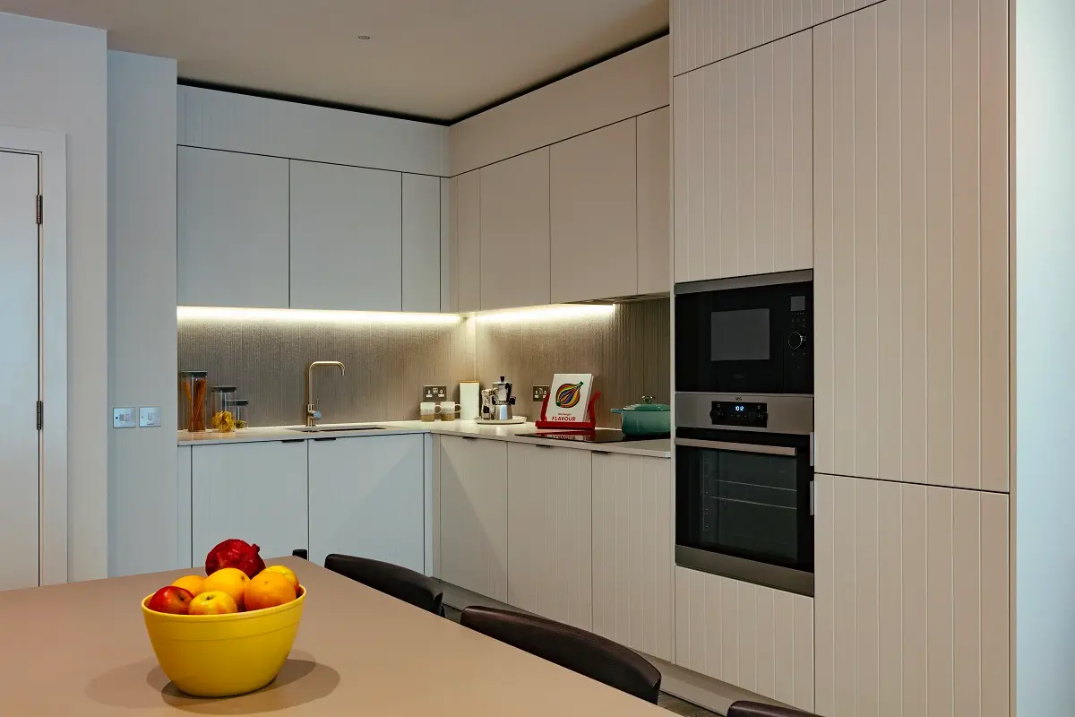 Thumbnail Modern fitted kitchen with integrated appliances at Coppermaker Square