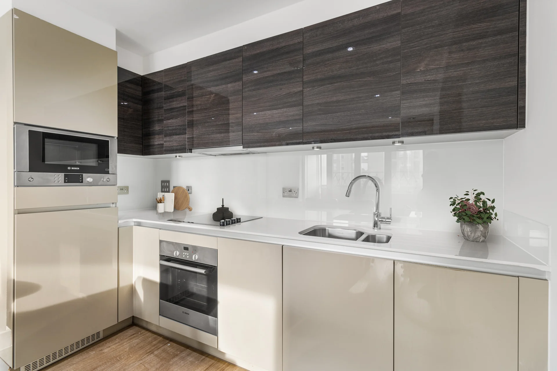 Thumbnail Modern kitchen at Fizzy Canning Town with high-gloss cabinets and built-in appliances