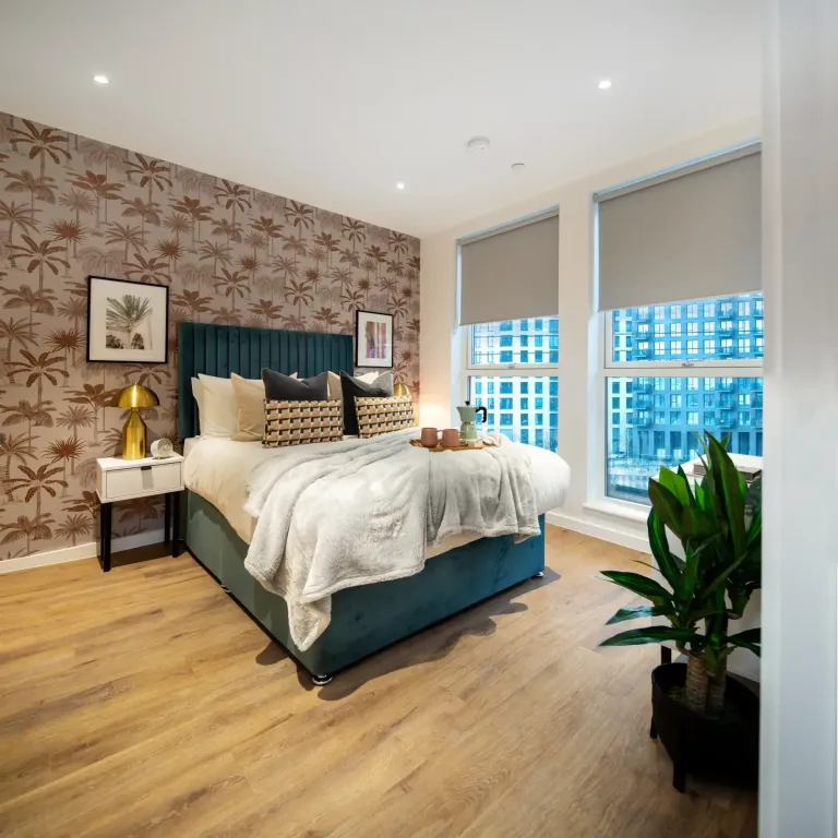 Thumbnail Stylish bedroom at Fizzy East16 with feature wall large windows and velvet bed