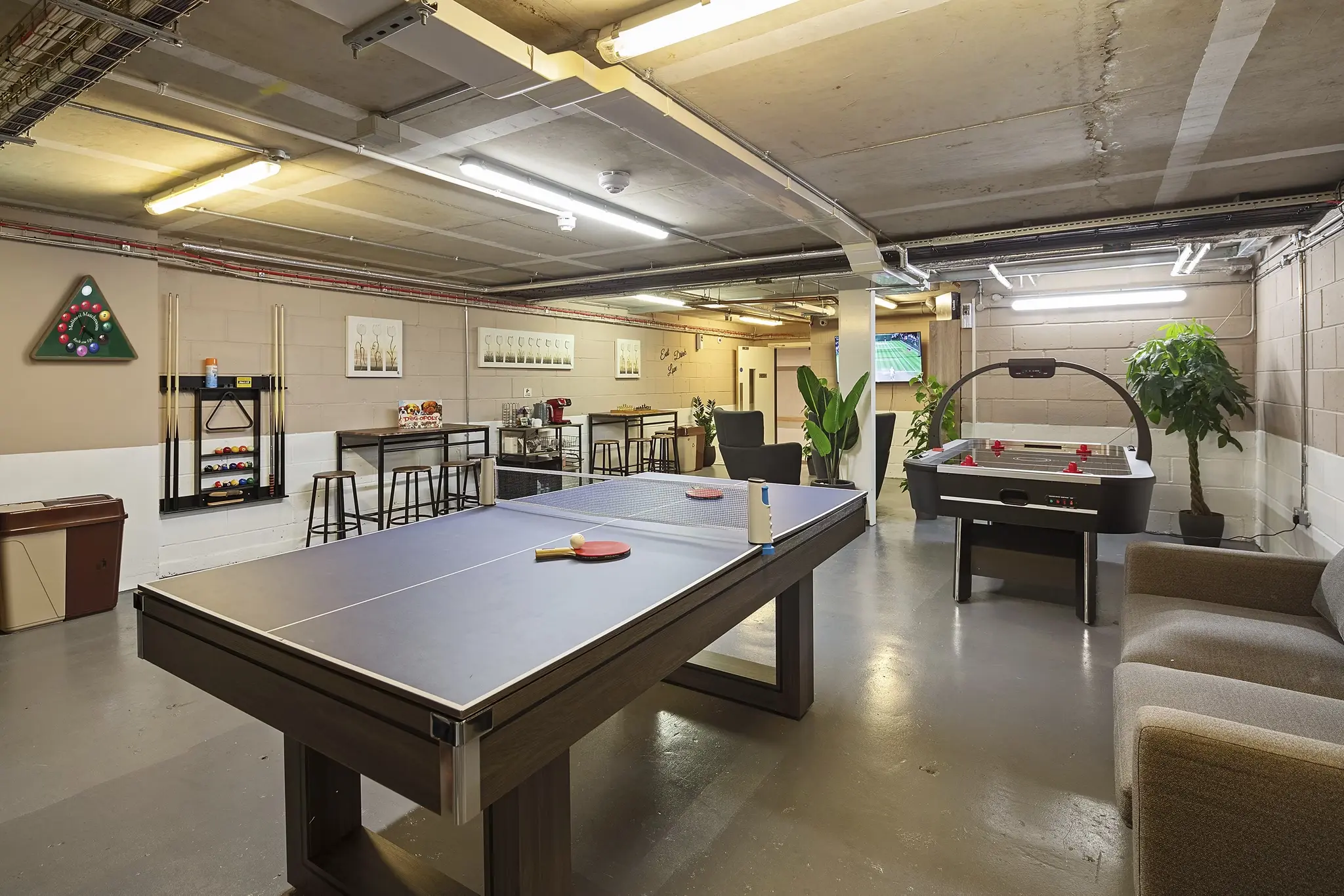 Thumbnail Fizzy Epsom communal area with table tennis, air hockey, seating, and games equipment