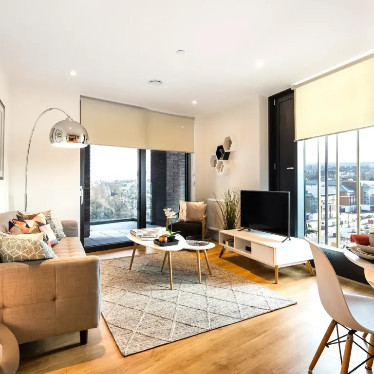 Thumbnail Bright contemporary living room at Fizzy Lewisham with balcony view, neutral decor, and mid-century style furniture