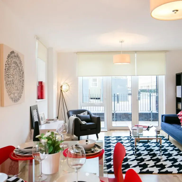 Thumbnail Contemporary living and dining room at Fizzy Stepney Green with bold rug, modern furniture, and large patio doors