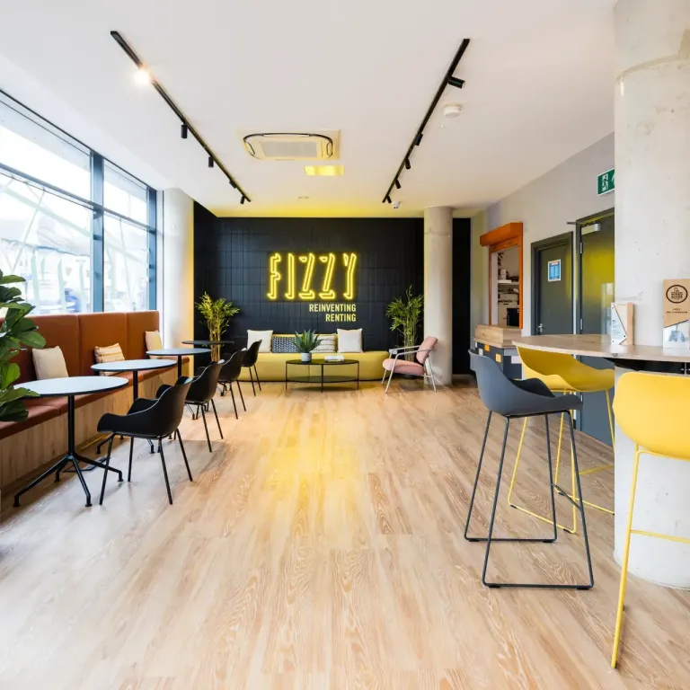 Thumbnail Stylish co-working space at Fizzy Walthamstow with neon signage and modern seating