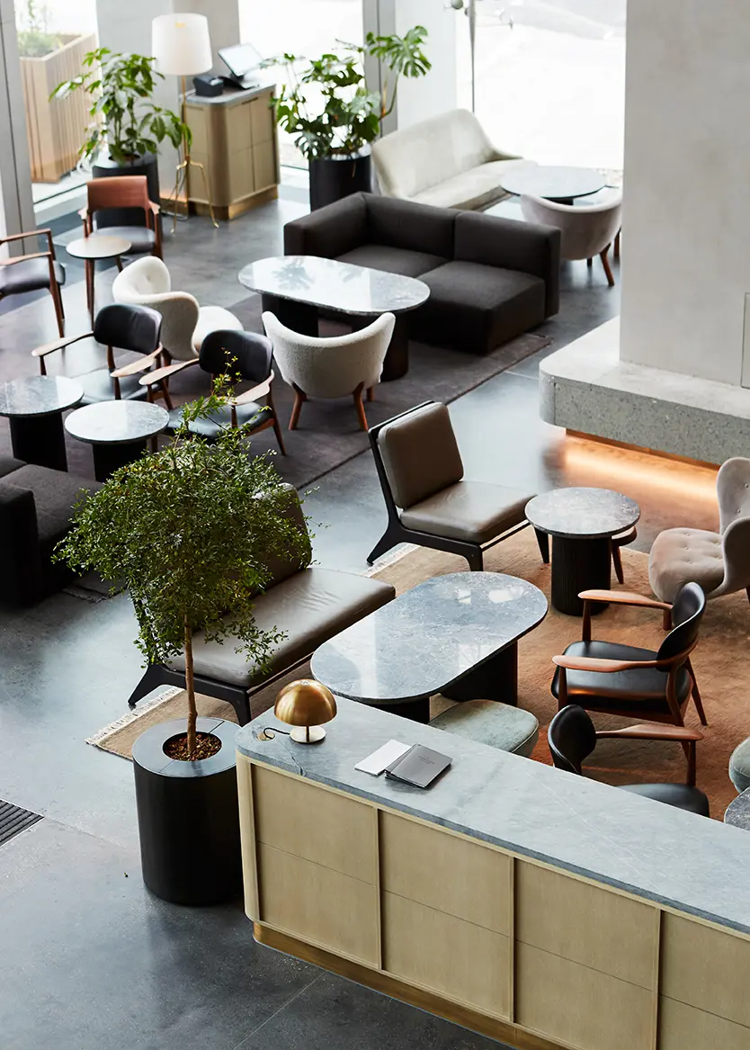 Thumbnail Stylish Manhattan Loft Gardens lobby with designer furniture and marble tables