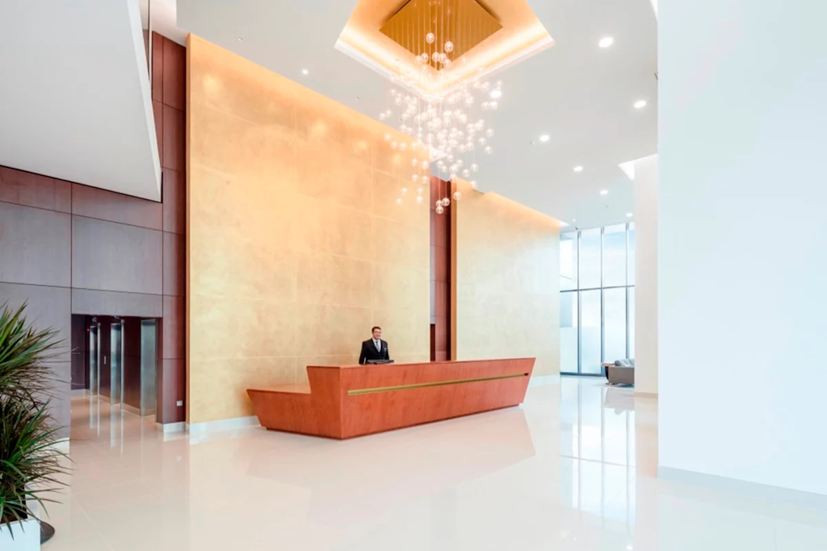 Thumbnail Concierge reception with feature lighting at MyLo Nine Elms Point