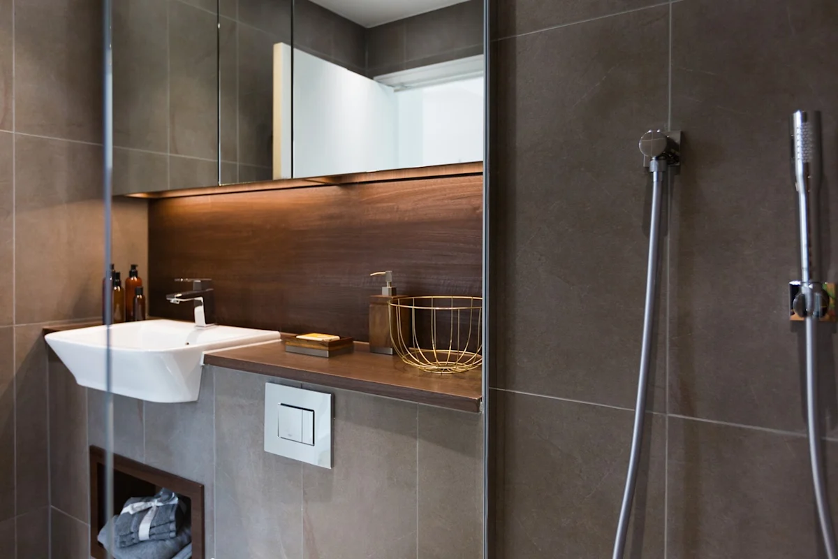 Thumbnail Stylish bathroom with wood accents at MyLo Nine Elms Point
