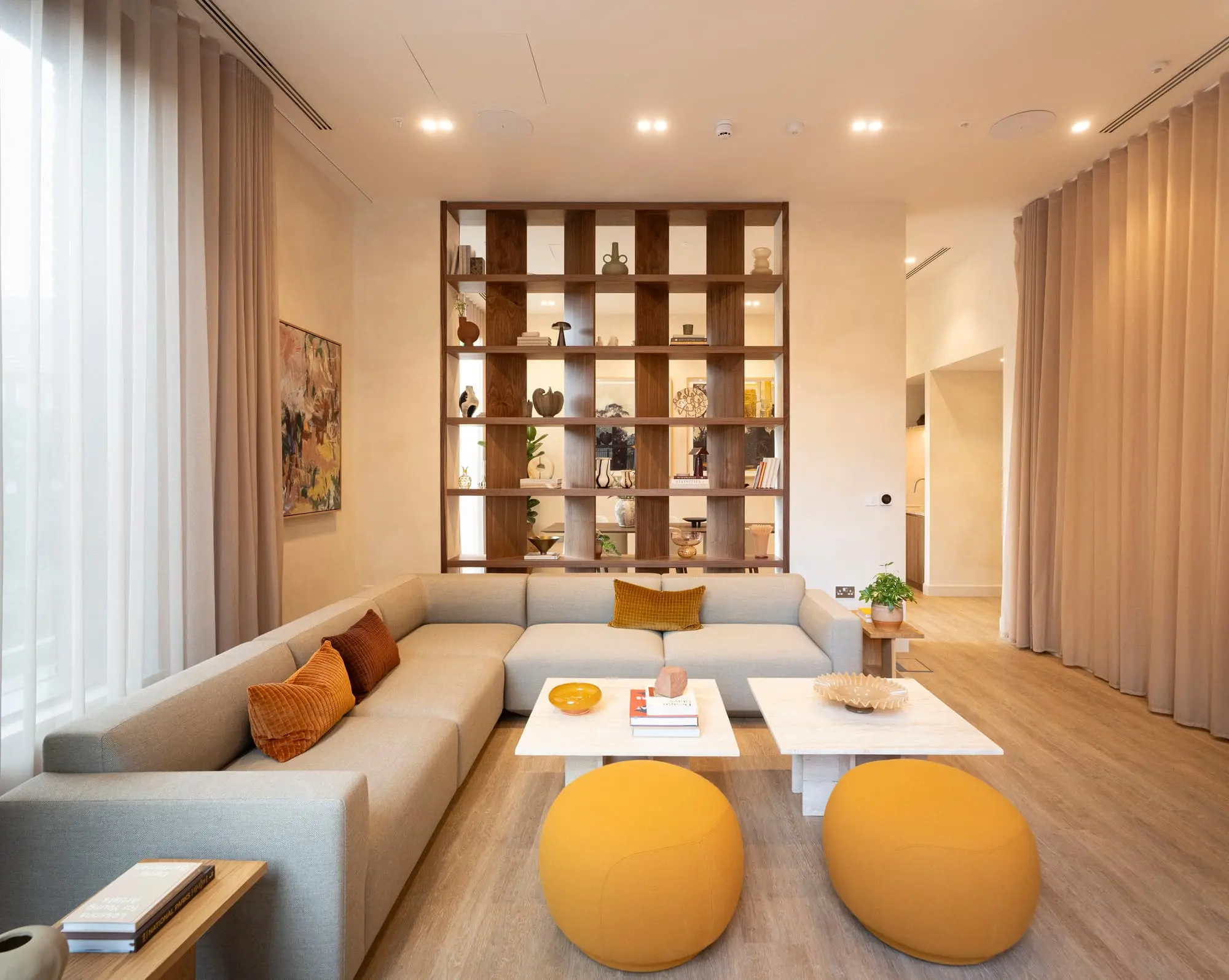 Thumbnail Contemporary living space with neutral tones and mustard accents in Pearlyard Bermondsey apartment
