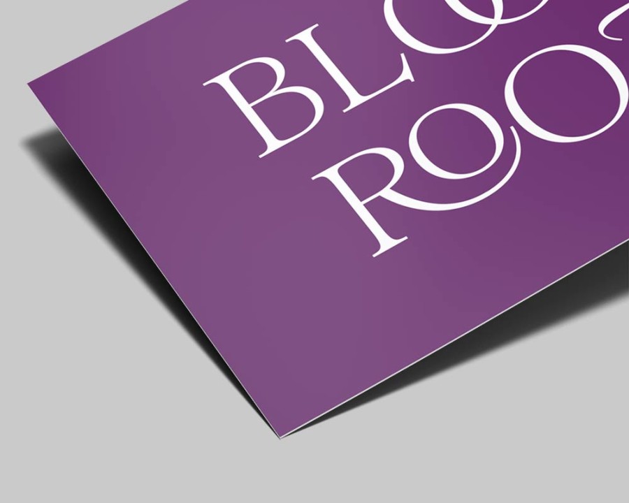 Close-up of Soft Touch business card finish showing velvety peach-skin texture