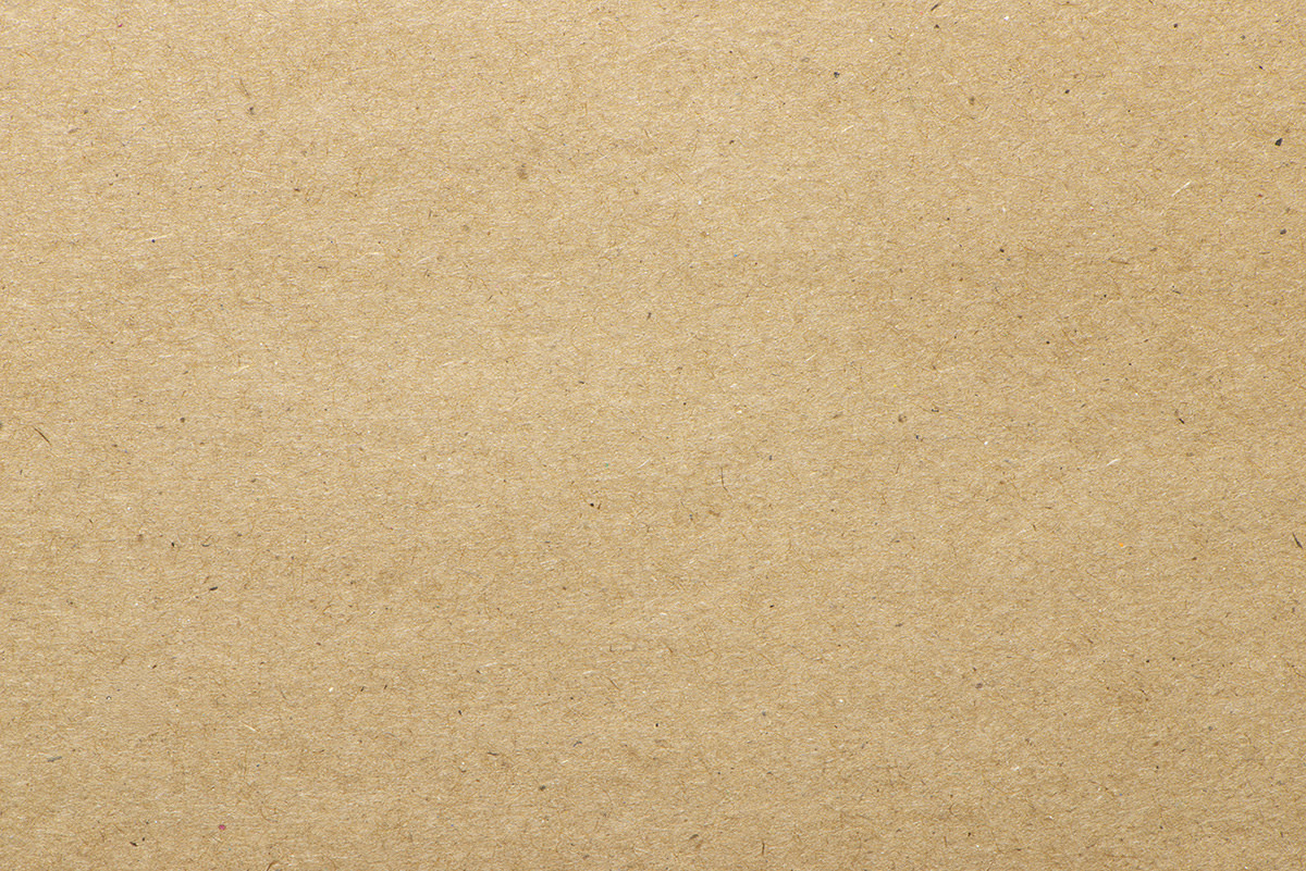 Kraft paper label stock with natural brown paper and raw earthy texture