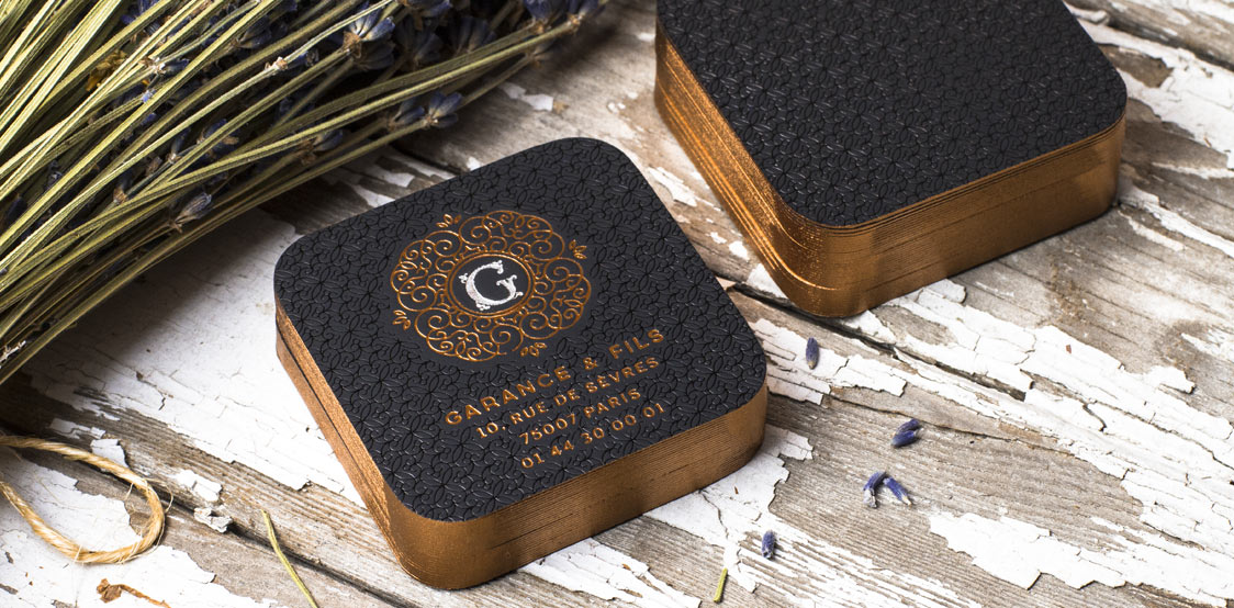 Premium black rounded business cards with copper painted edges